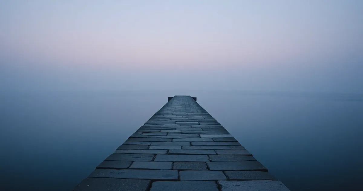 A stone causeway running out across still water at dusk, illustrating Foreign-owned US LLC and Form 5472