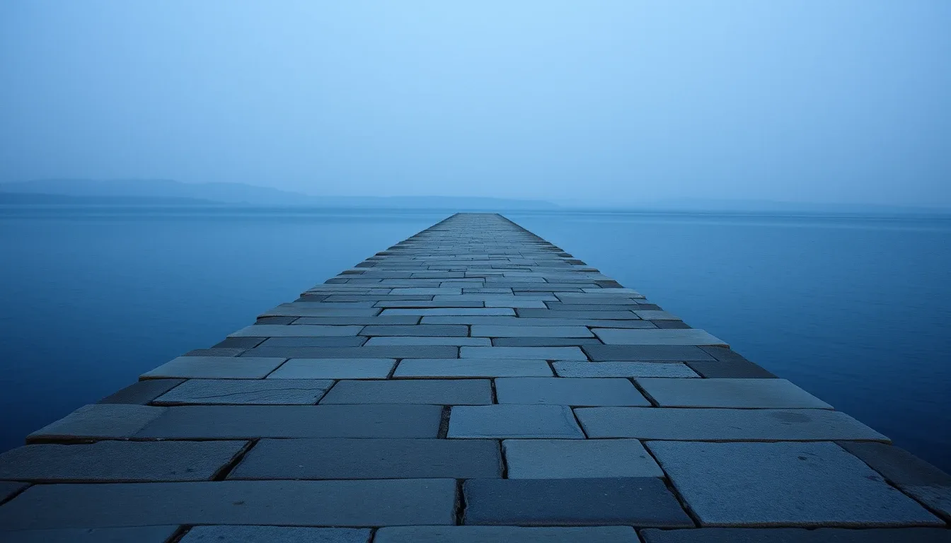 A stone causeway running out across still water at dusk, illustrating UK to US transfer pricing