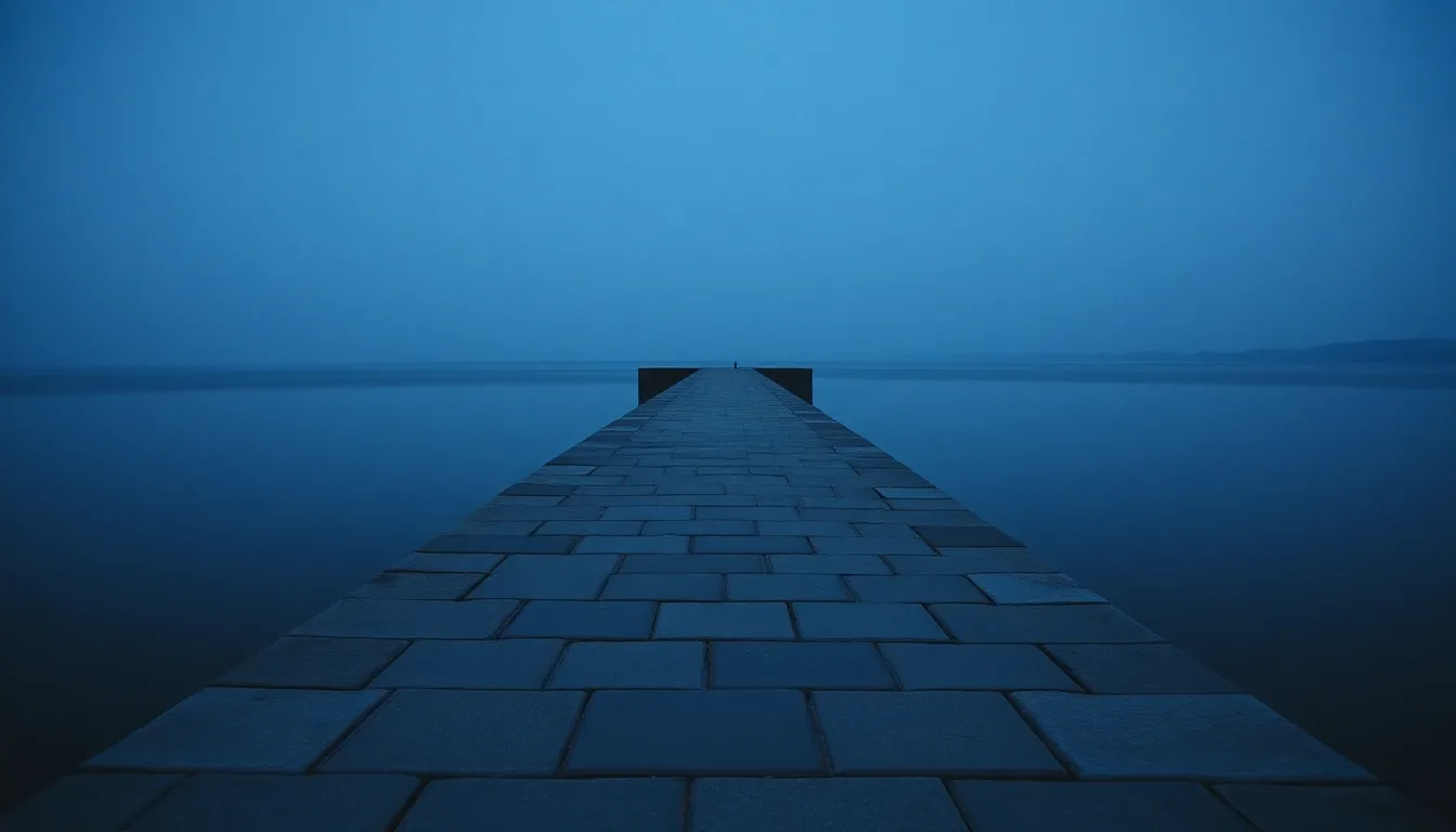 A stone causeway running out across still water at dusk, illustrating US LLC profits and UK tax